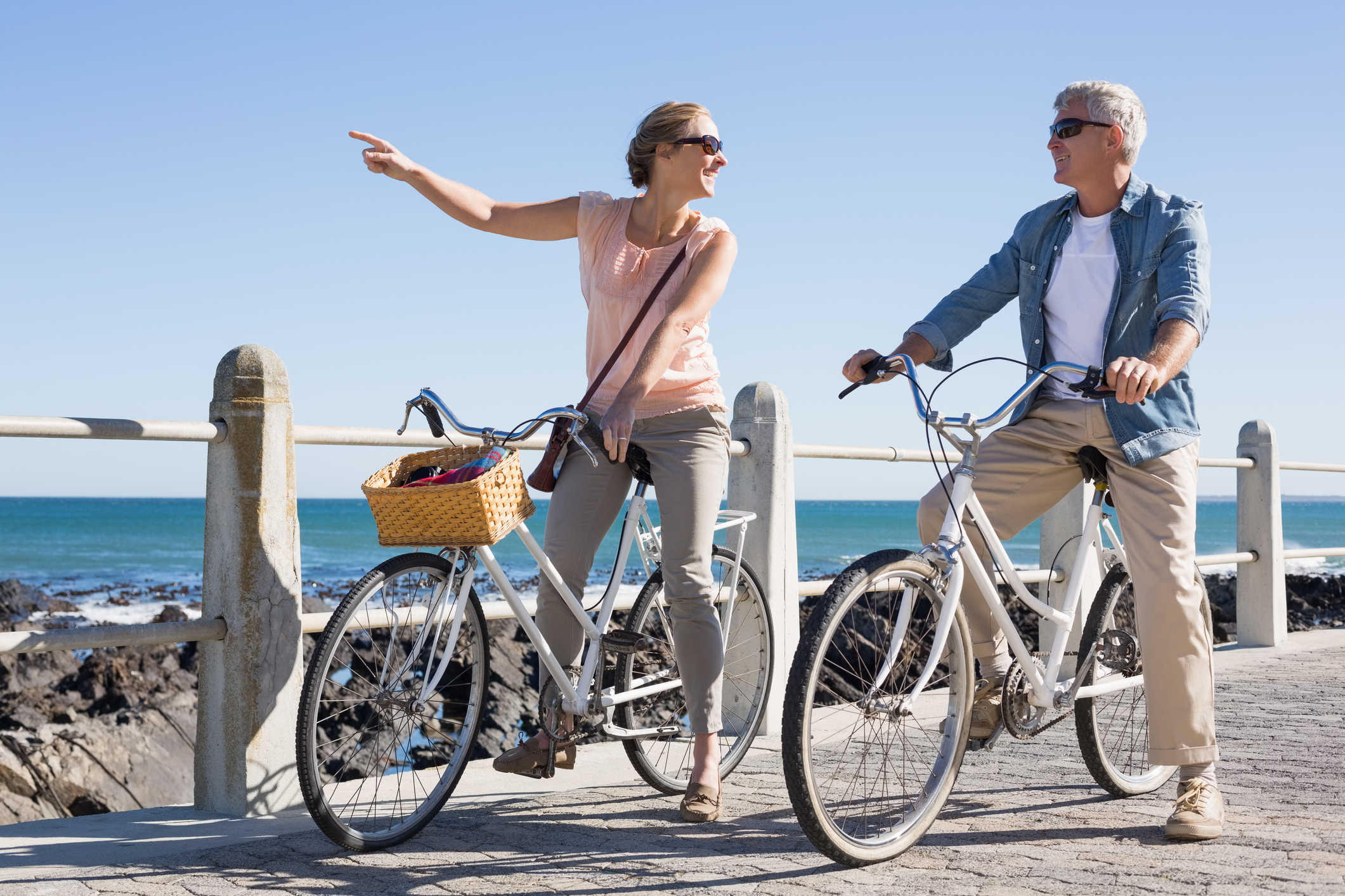 Happy Casual Couple Going For A Bike Ride On The Pier 4242